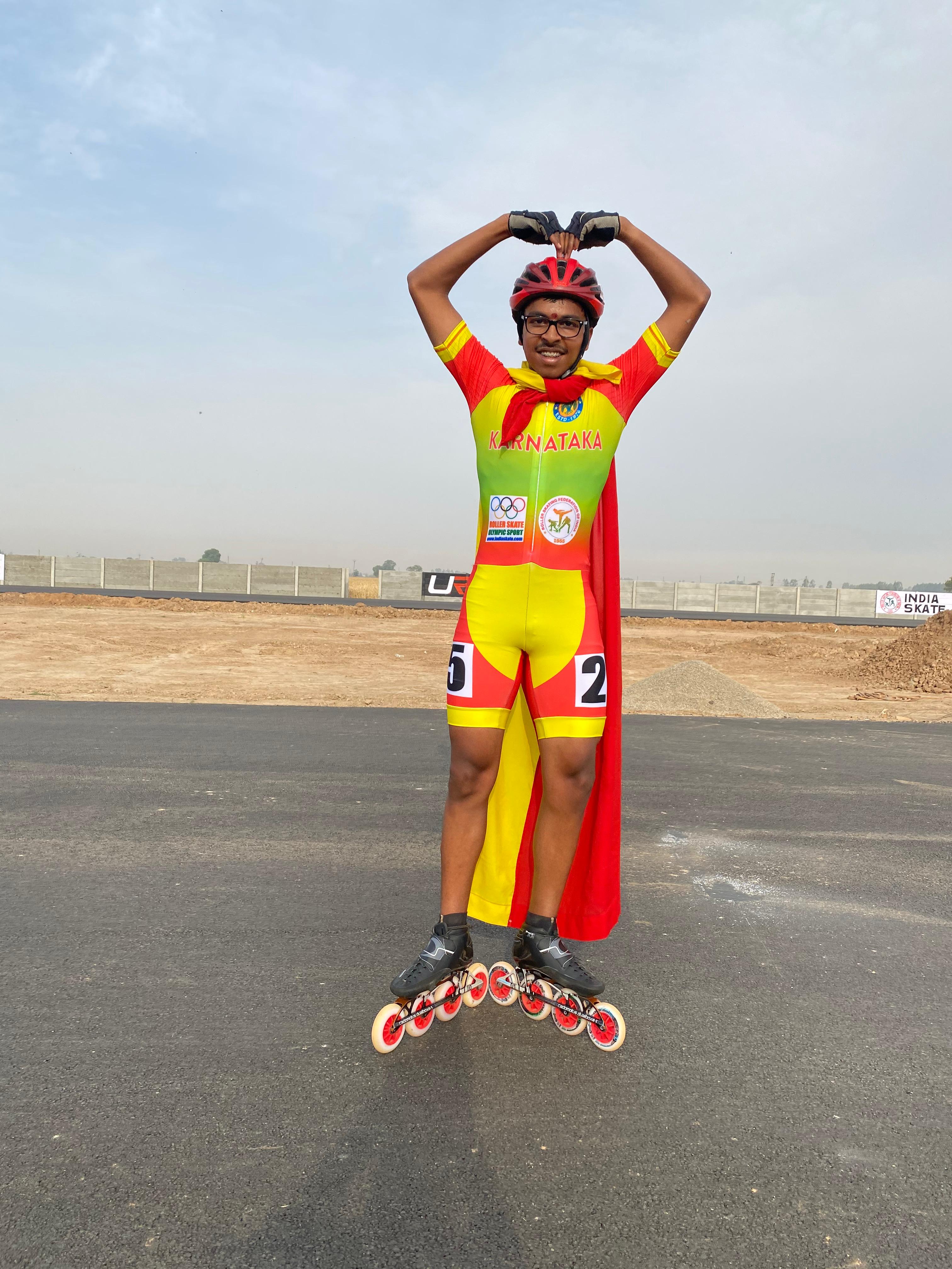 Anush wearing Karnataka skating kit and inline skates